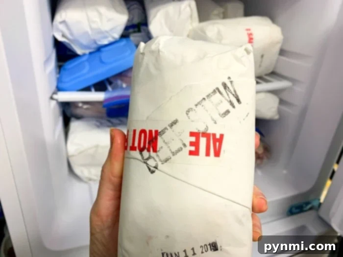 Raw beef stew meat in a package