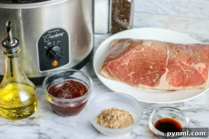 Fall-Apart Slow Cooker BBQ Beef 3 crockpot shredded beef - tender beef after slow cooking