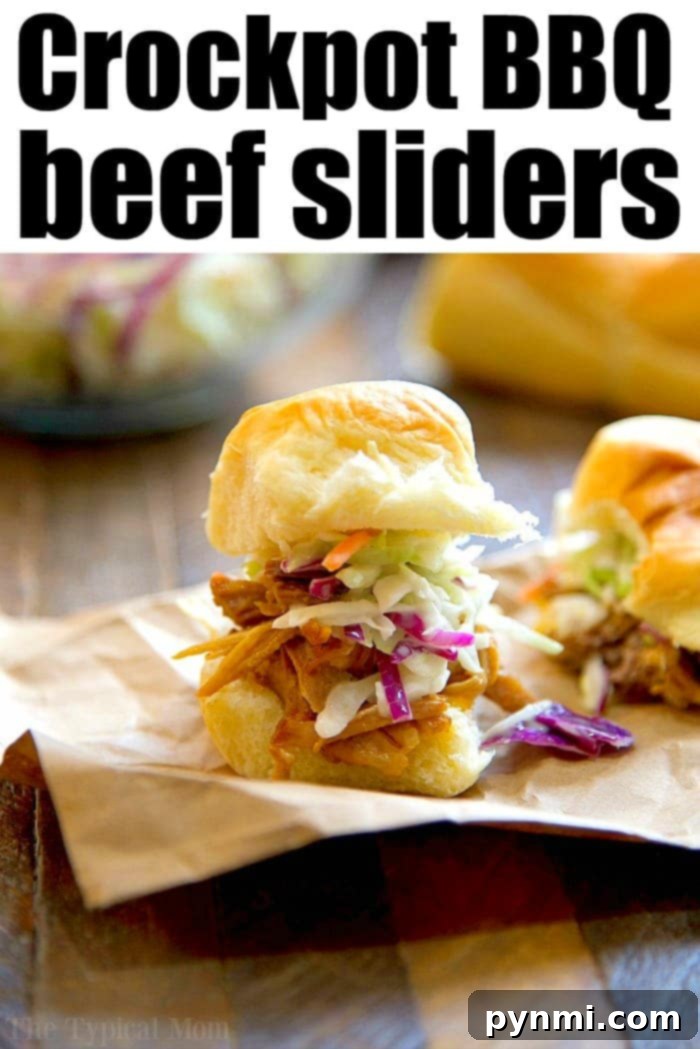 Fall-Apart Slow Cooker BBQ Beef 6 slow cooker bbq beef piled high on buns
