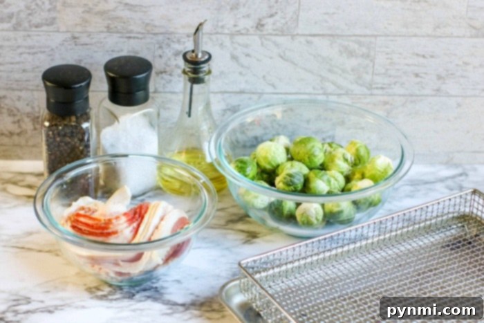 Golden Air Fried Bacon Wrapped Sprouts 4 Close-up of bacon and brussel sprouts in an air fryer basket