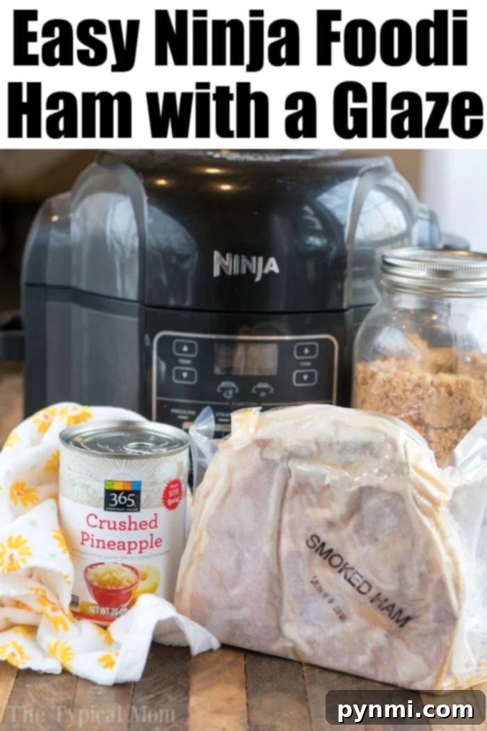 Deliciously cooked ham with pineapple in a Ninja Foodi, showcasing the best way to make ham for holidays.