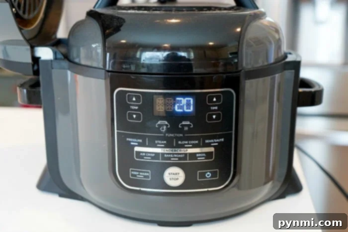 A close-up of a Ninja Foodi with various Ninja Foodi recipes, highlighting ease and convenience.