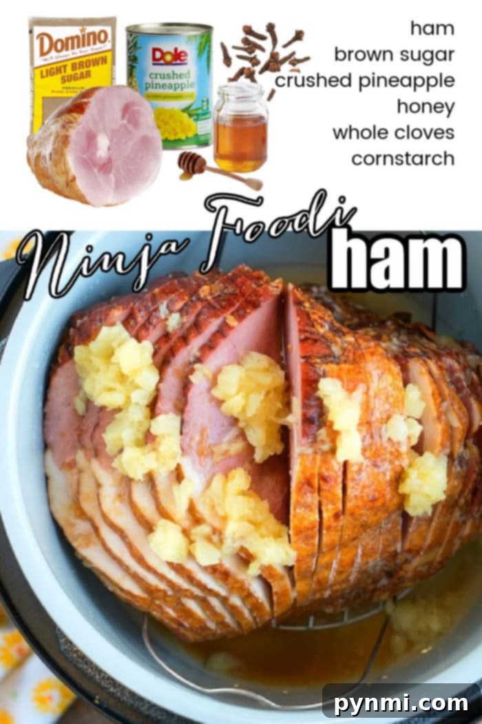A stunning Ninja Foodi ham recipe, garnished with pineapple and herbs, ready for a festive table.