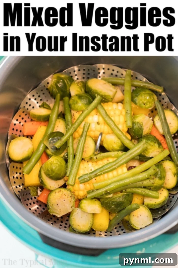 A bowl of freshly steamed pressure cooker vegetables seasoned and ready to serve. Pressure Cooker Vegetables