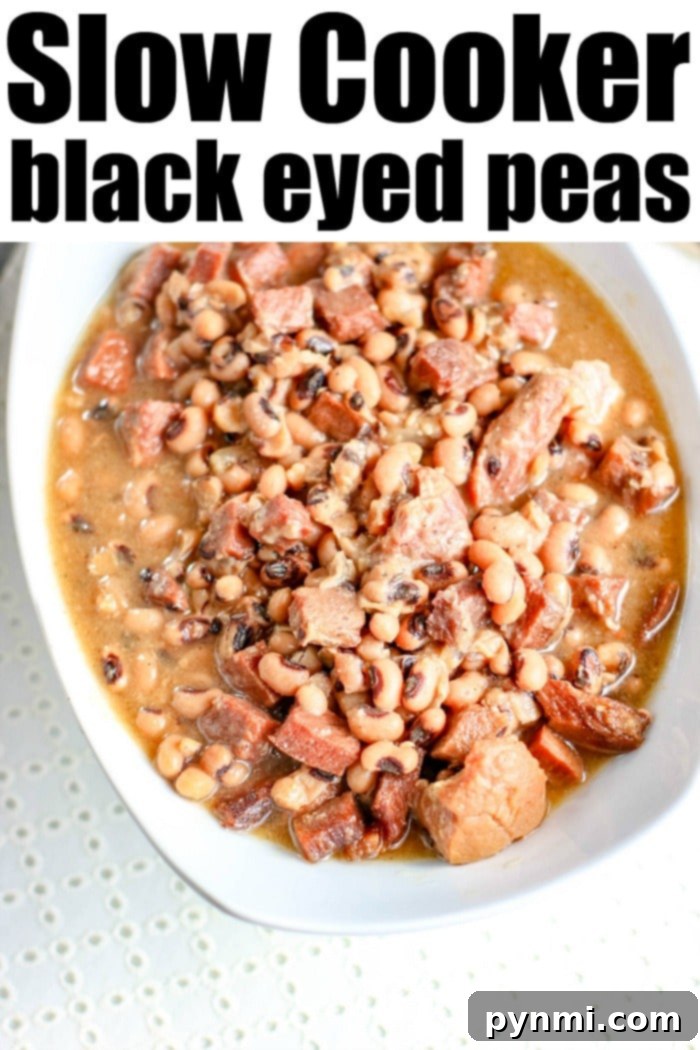 A bowl of hot crockpot black eyed peas ready to be enjoyed as a hearty meal.