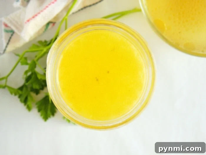 Quick Homemade Instant Pot Chicken Broth 2 Instant Pot chicken broth in a glass jar