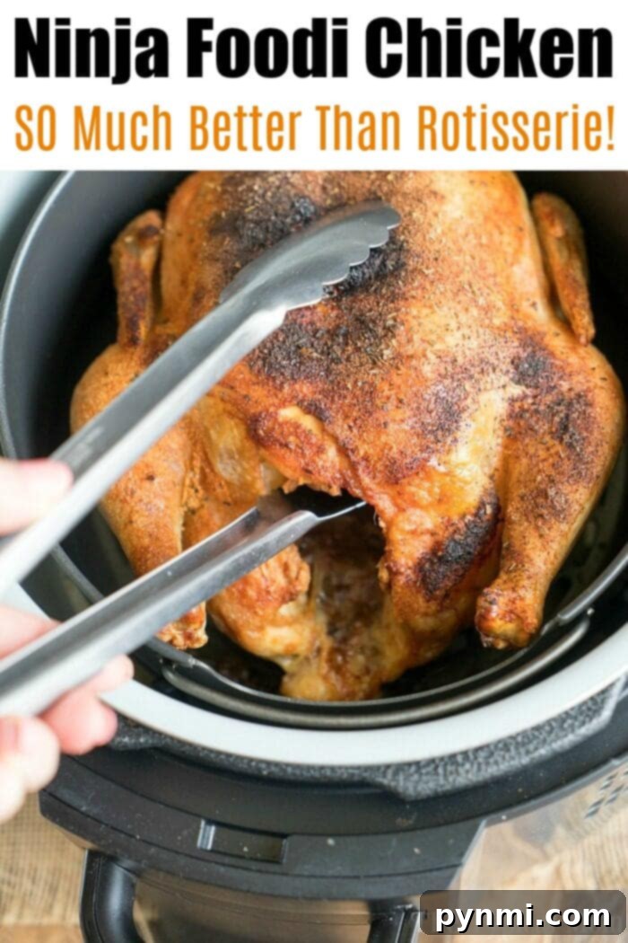 A whole chicken, seasoned and cooked to crispy perfection in a Ninja Foodi air fryer, demonstrating an excellent low-carb main dish.