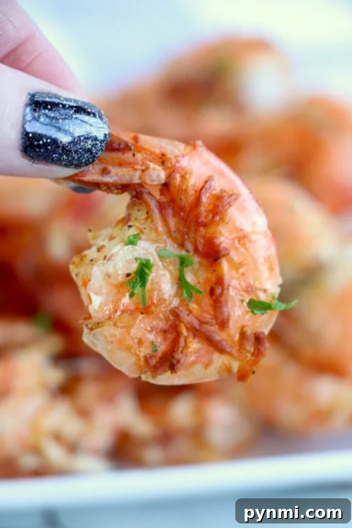 Air fryer frozen shrimp comes out tender and delicious in no time at all! Forget to defrost dinner? NO problem in your Ninja Foodi or other brand. Try this! #airfryer #airfryershrimp #shrimp #ninjafoodi #ninjafoodishrimp #frozenshrimp air fryer frozen shrimp