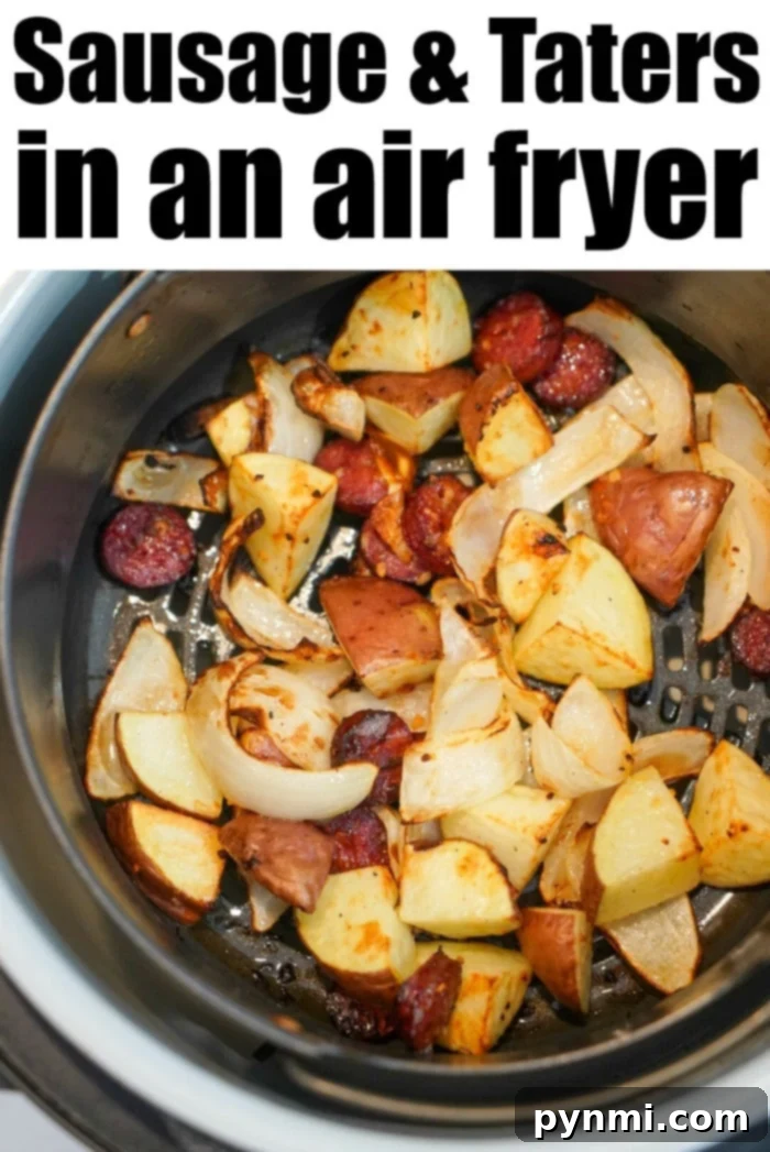 Close-up of air fryer sausage and potatoes with a fork, showing tenderness