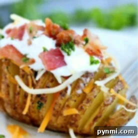 Crispy Air-Fried Hasselback Potatoes 5 An air fryer Hasselback potato is loaded with cheese, crispy bacon, sour cream, and fresh herbs.