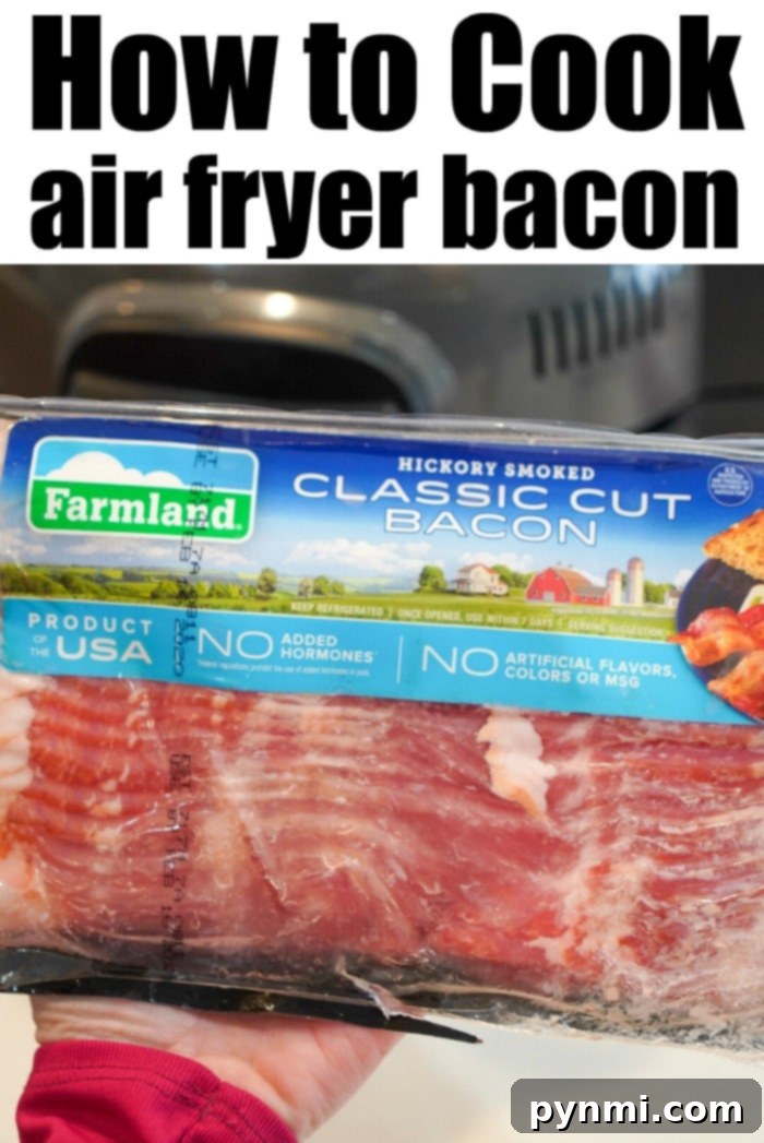 Crispy strips of air fryer bacon resting on a wire rack, showcasing perfectly cooked bacon ready to be enjoyed for breakfast or as an ingredient.