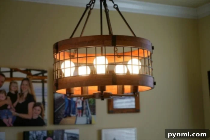 30-Day Home Reset: Your Weekly Checklist 5 dusting a chandelier during 30-day clean house checklist