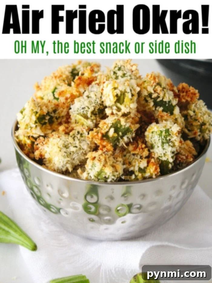 Crispy Air-Fried Okra Perfection 7 A bowl of delicious air fryer okra with a crispy coating is elegantly placed on a white napkin.