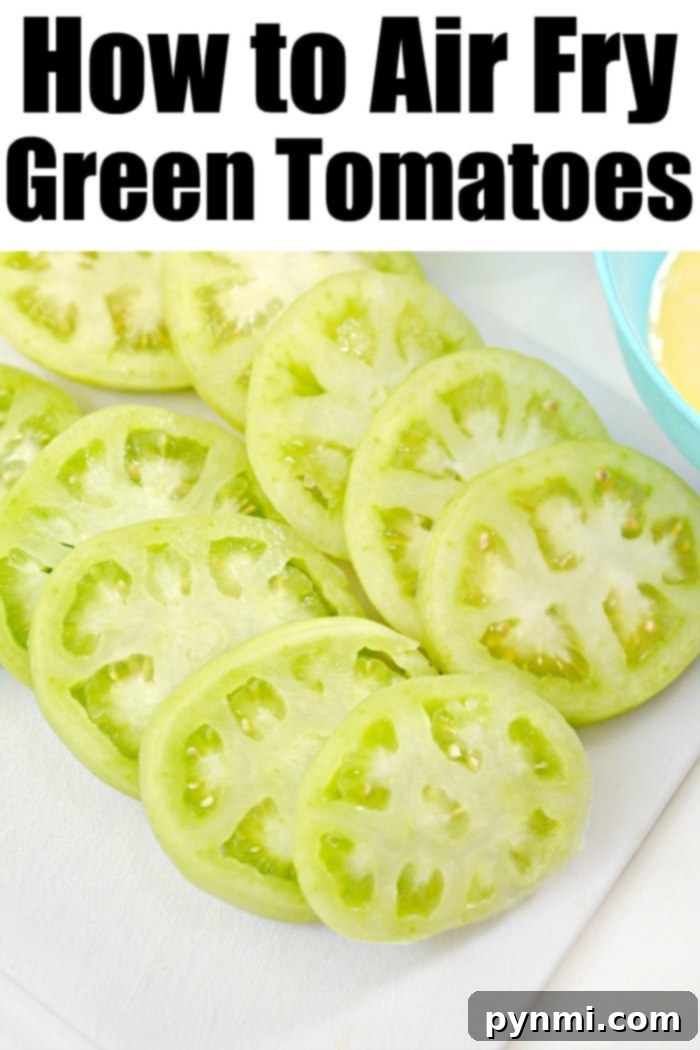 Air fryer fried green tomatoes are easier to make crispy delicious than you might think! How to make your favorite crunchy vegetable side dish tonight. #greentomatoes #airfryerrecipes #ninjafoodi #airfryer fried green tomatoes - Perfectly air-fried green tomatoes for a healthy snack or side