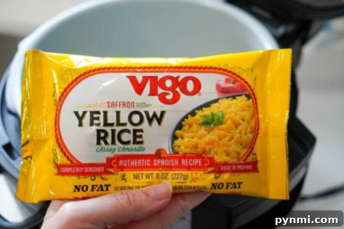 All-in-One Ninja Foodi Pork Chops and Rice 5 Close-up of saffron yellow rice, a flavorful base for Ninja Foodi pork chops