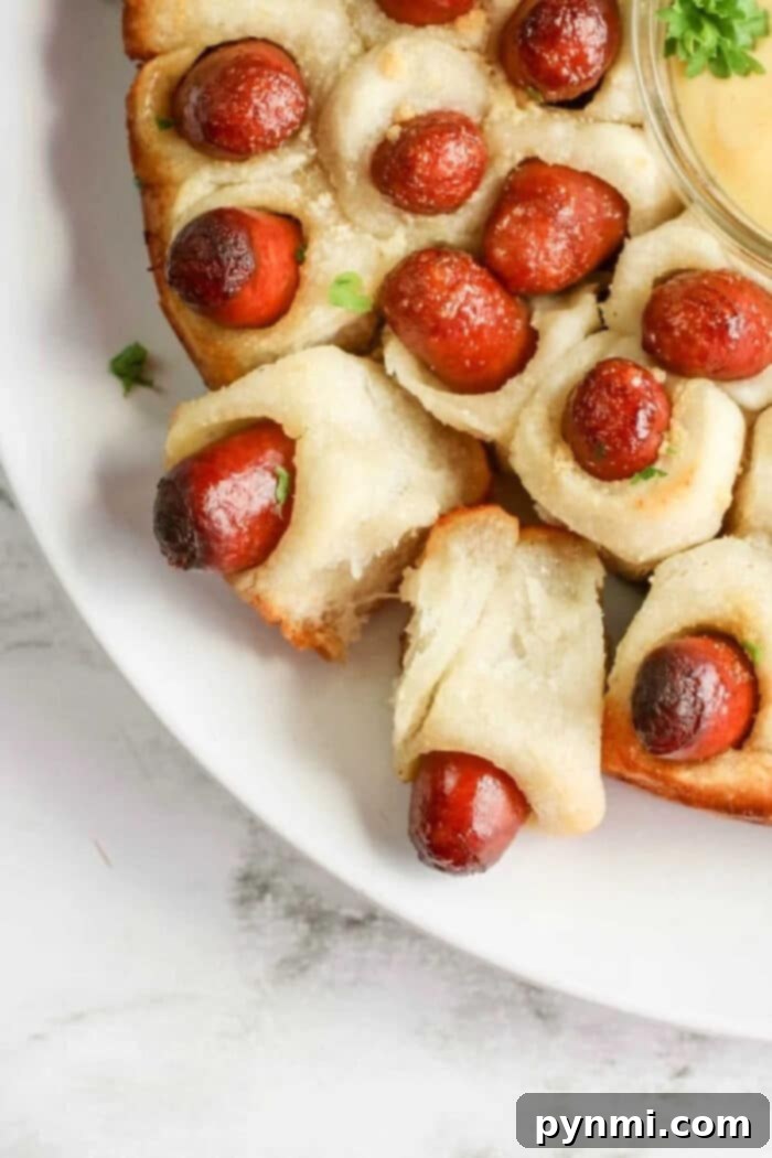 An overhead shot showcasing a beautifully baked pull-apart bread, emphasizing its shareable and inviting presentation.