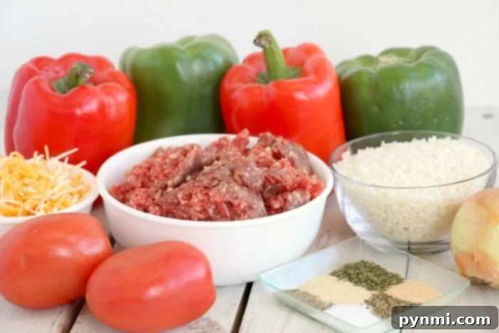 Perfect Air Fryer Stuffed Peppers 3 A selection of fresh ingredients including bell peppers, ground meat, and spices, ready for making stuffed peppers.
