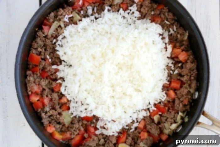 Perfect Air Fryer Stuffed Peppers 5 All the necessary ingredients laid out for making delicious stuffed bell peppers.