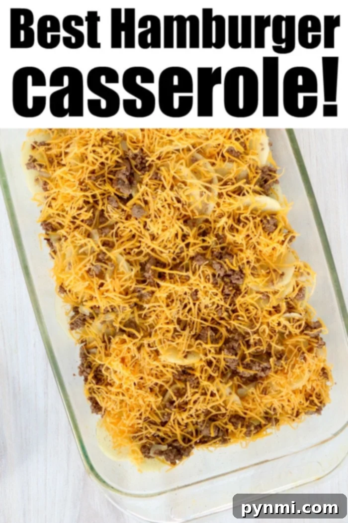 A completed easy ground beef casserole, garnished and ready for serving.
