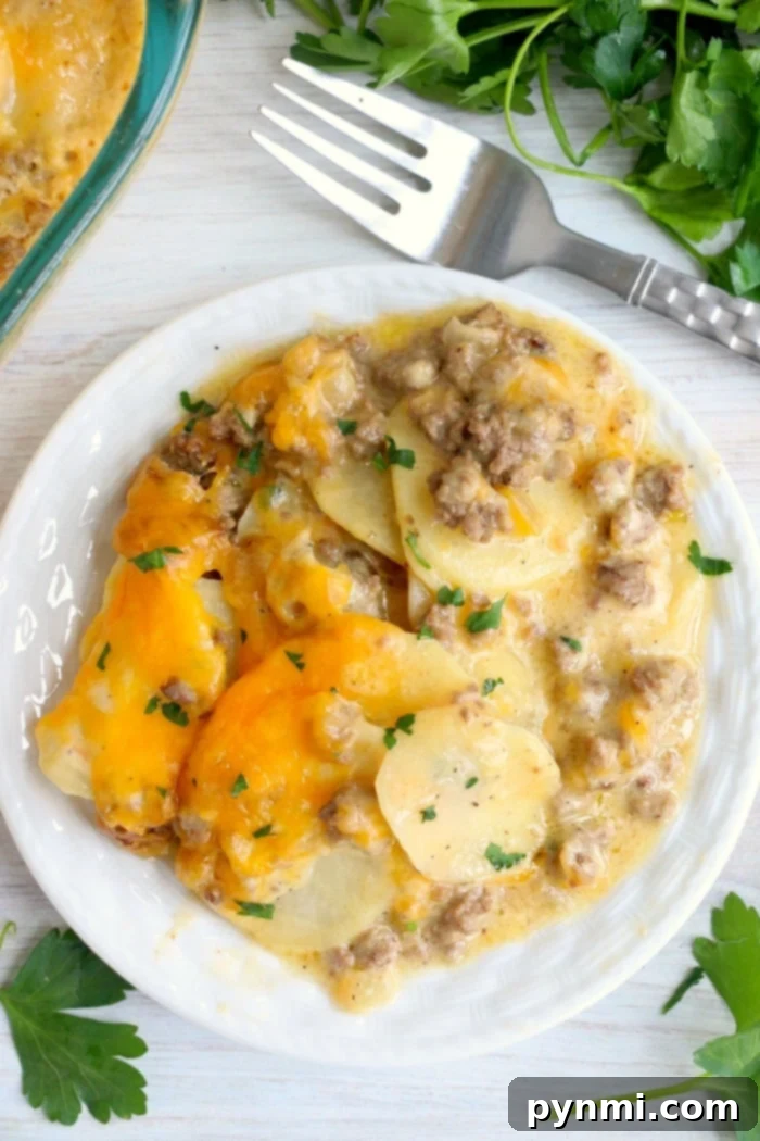 A freshly baked cheesy potato casserole with melted cheese and tender potatoes.