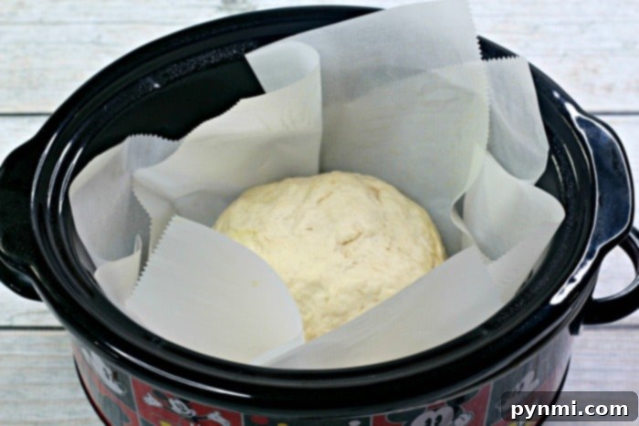 Effortless Slow Cooker Bread 4 Sliced crockpot bread with a soft interior texture.