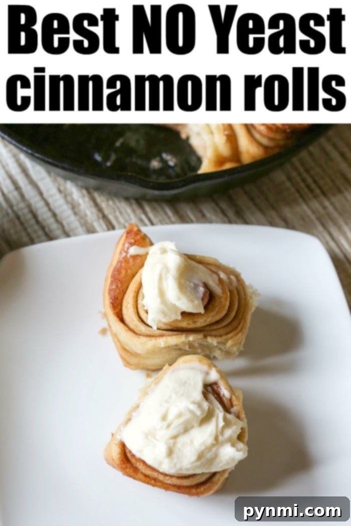 This cinnamon roll recipe no yeast needed is amazing! Using a sourdough starter these overnight rolls turn out fluffy and baked to perfection. Perfect treat Close-up of a warm, frosted sourdough cinnamon roll, highlighting its fluffy texture and golden crust, showcasing a perfect no-yeast recipe.