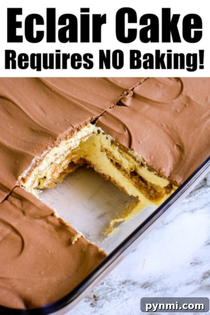 Fully assembled no-bake eclair cake with chocolate topping, chilling in the refrigerator.
