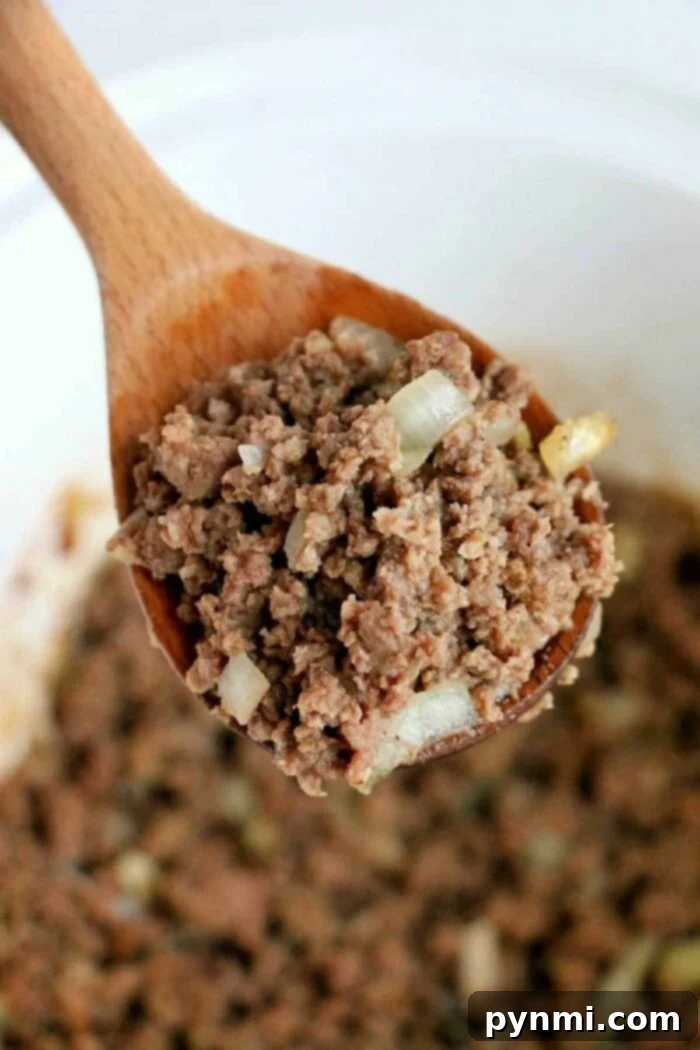 Effortless Crockpot Ground Beef Meals 2 Tender crockpot hamburger meat, ready to be used in various recipes.