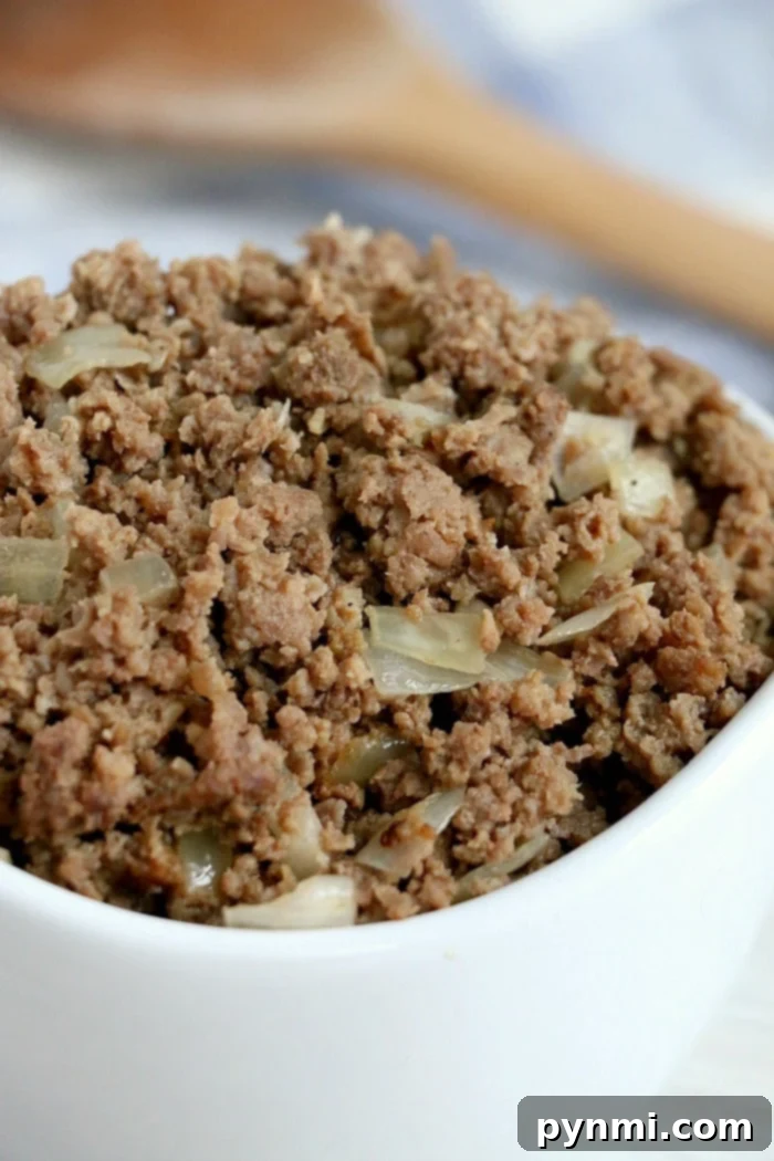 Effortless Crockpot Ground Beef Meals 5 Close-up of raw hamburger meat ready for the slow cooker.