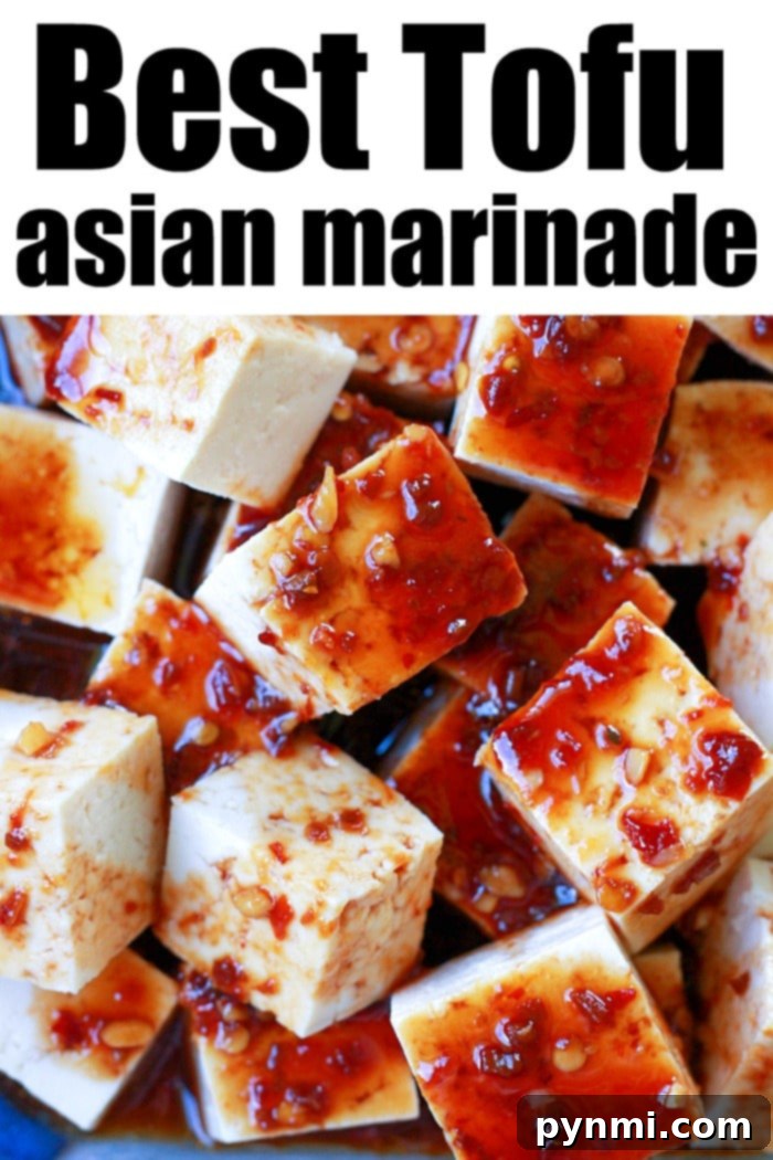 Baked tofu marinated in Asian sauce, close up of crispy texture