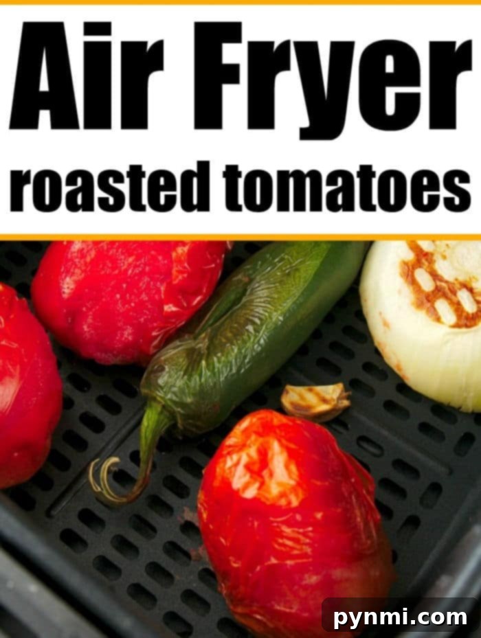 Flavor-Packed Air Fryer Tomatoes 8 A large batch of air fryer roasted tomatoes cooling on a plate, showcasing their readiness for various culinary uses.