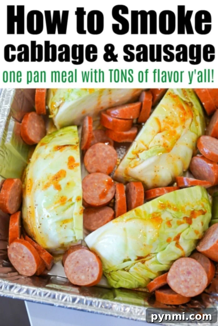 A foil tray filled with seasoned, chopped cabbage and smoked sausage, ready to be placed in the smoker. Text overlay reads: 'How to smoke cabbage & sausage, one-pan meal with TONS of flavor y'all!'