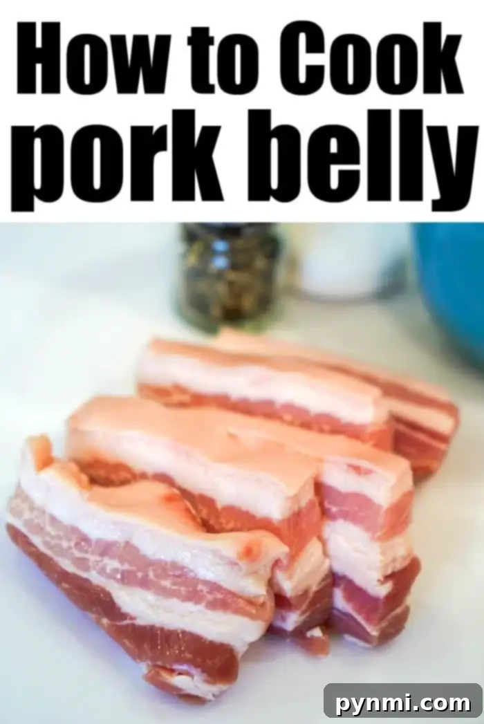 Image of three thick slices of raw pork belly on a white surface with text at the top that reads "How to Cook Air Fryer Pork Belly" in bold black letters. In the background, there is a blurry, partially visible pepper grinder and other kitchen items.