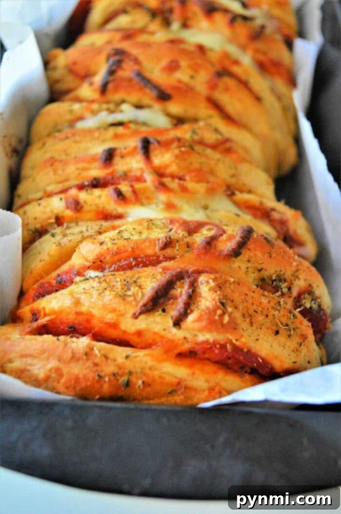 Ultimate Pizza Monkey Bread 2 Delicious Pull Apart Pizza Bread made with Refrigerated Biscuits, perfect for sharing and easy to make