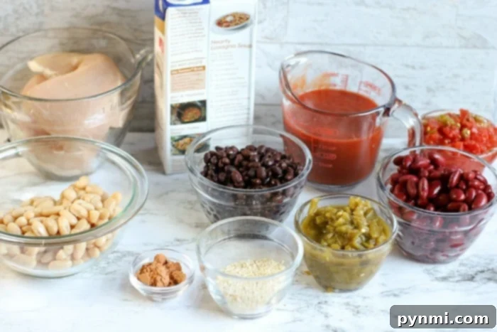 Hearty Instant Pot Chicken Chili 4 A bowl of Instant Pot chicken chili with various toppings.