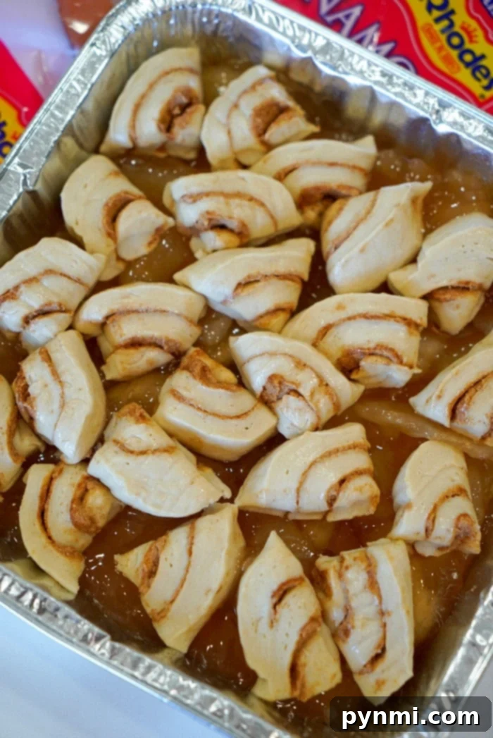 Irresistible Rhodes Cinnamon Rolls 7 Freshly baked cinnamon roll casserole with apple pie filling, glazed and ready to serve