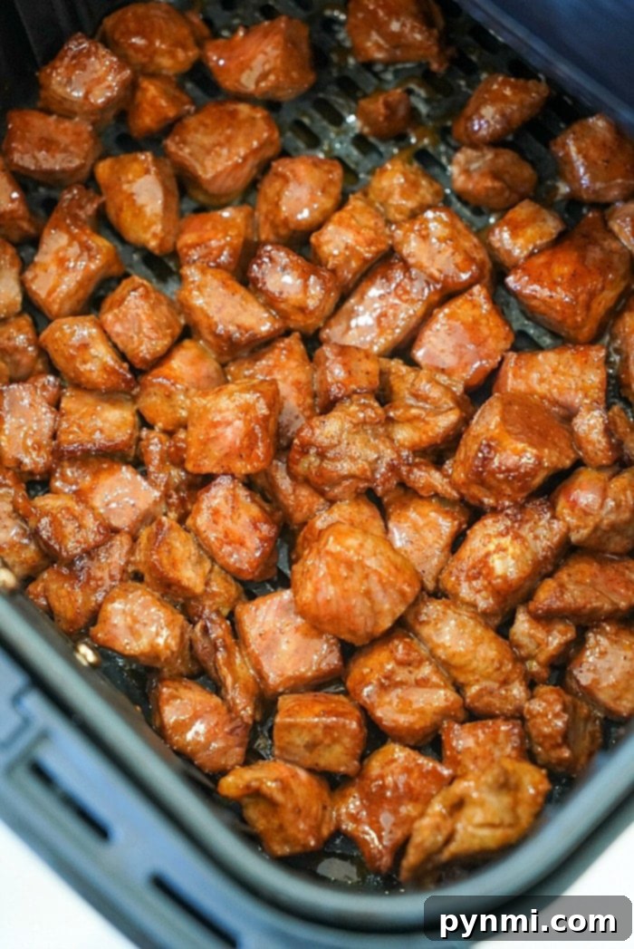 Juicy Air Fryer Steak Bites in Minutes 10 Air fryer steak bites plated beautifully for a meal.