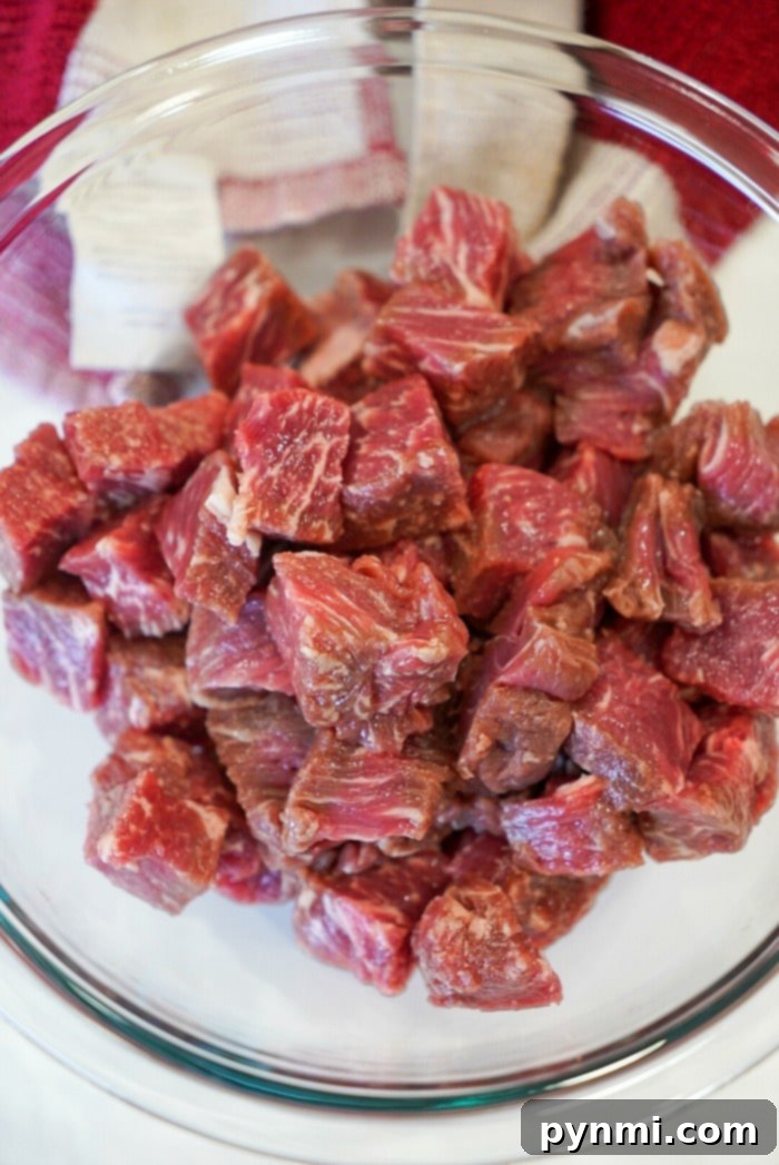 Juicy Air Fryer Steak Bites in Minutes 7 Step-by-step image showing how to make steak bites in an air fryer.