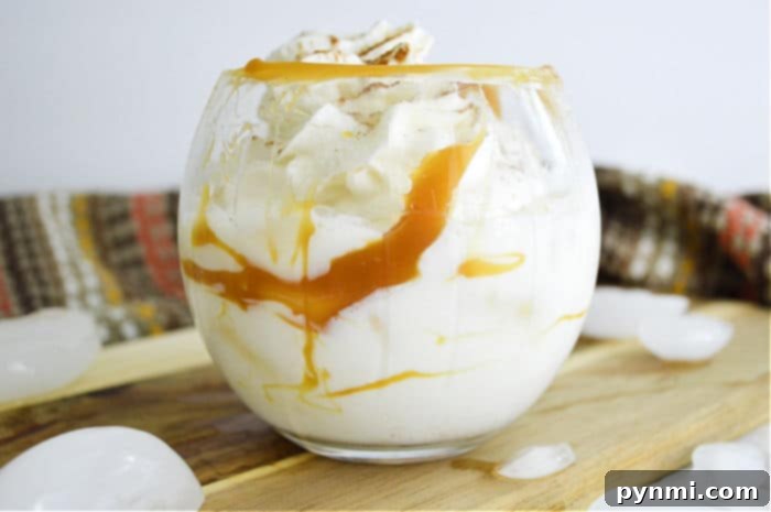 Easy 3-Ingredient Pumpkin Cocktail 6 Three Pumpkin drinks served in clear glasses, garnished with whipped cream and cinnamon