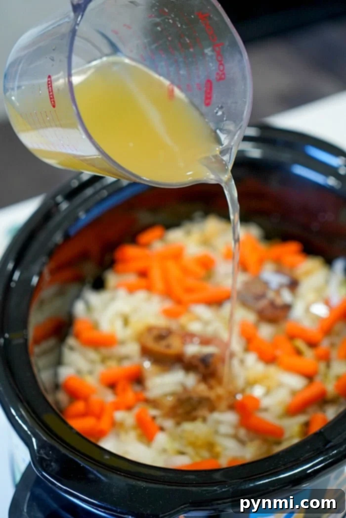 Hearty Slow Cooker Ham and Potato Soup 8 Large pot of slow cooker ham soup with chunks of ham and vegetables