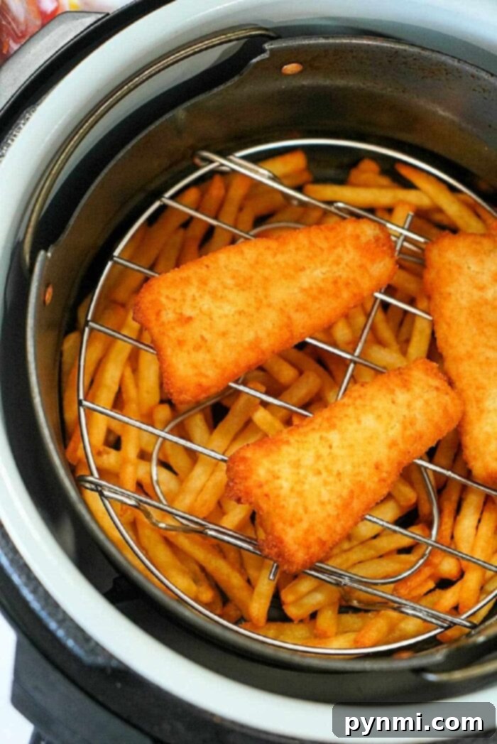 Crispy Air Fryer Fish and Chips 9 Close-up of frozen fish and chips, ready to be air-fried to perfection.