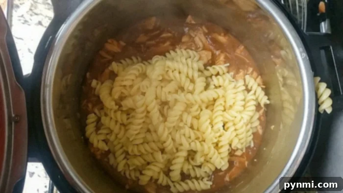 turkey pasta - A vibrant pasta dish with shredded turkey and a rich sauce, perfectly combined.