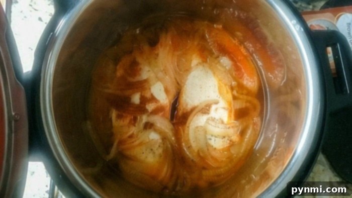 turkey tenderloin recipe - A rich, thick gravy being whisked in the Instant Pot, infused with the turkey's cooking liquids.