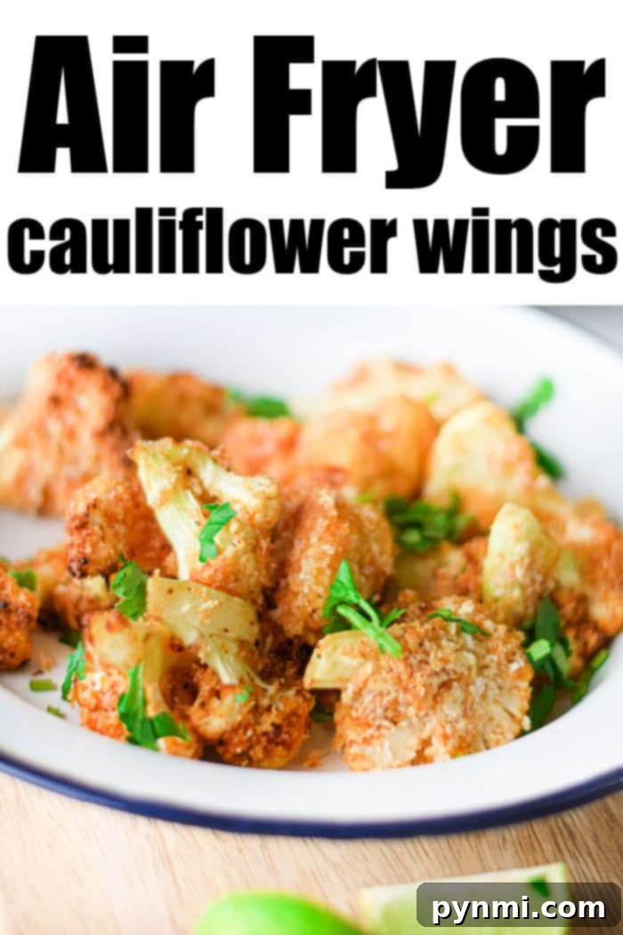Panko Crusted Air Fryer Buffalo Cauliflower Wings 7 A generous serving of air fryer cauliflower wings, golden and inviting, ready to be picked up.