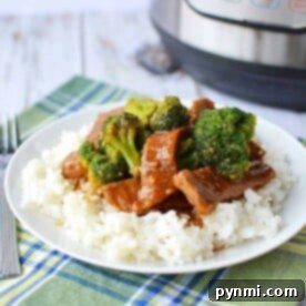 Pressure-Cooker-Beef-and-Broccoli, featuring tender beef and vibrant broccoli florets tossed in a rich, savory sauce.