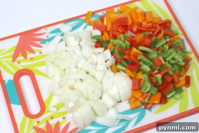 Mastering Onions A Guide to Every Type 5 Fresh Bell Peppers and Onions Ready for Stir-Fry