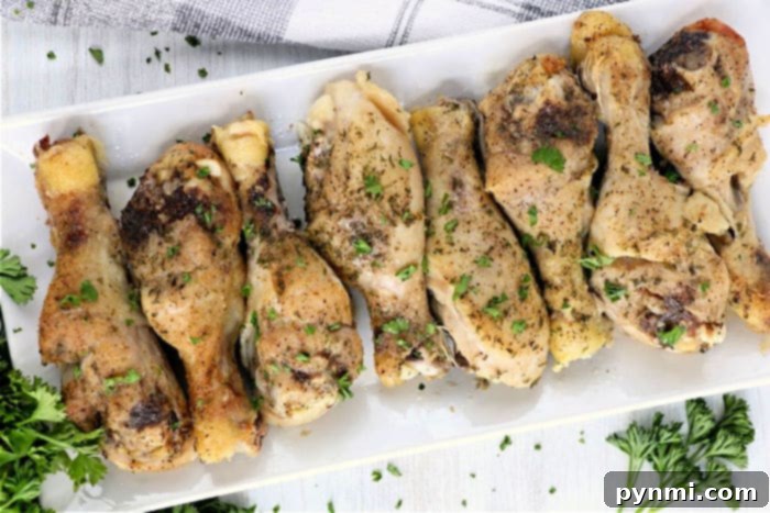 Fall-Off-The-Bone Slow Cooker Chicken Legs 8 Close-up of perfectly cooked chicken drumsticks.