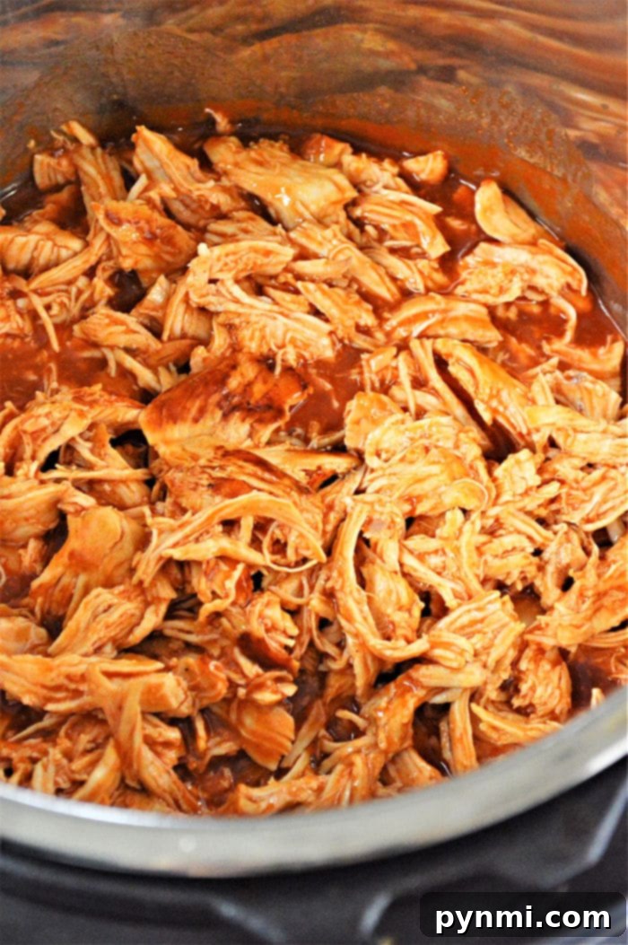Ninja Foodi buffalo chicken served with fresh garnishes