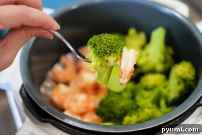 Instant Pot broccoli and shrimp cooked together for a healthy and quick meal.