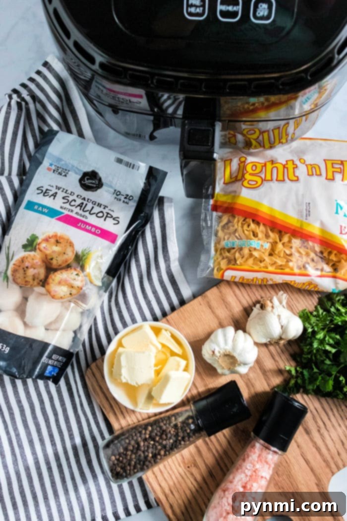 Golden Air Fryer Scallops 3 Fresh scallops seasoned with herbs, arranged in an air fryer basket, ready for cooking.